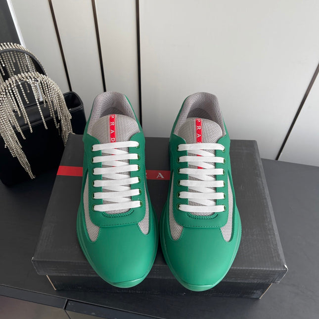 PRADA 26S AMERICA CUP SNEAKERS IN TEAL GREEN SOFT RUBBER AND BIKE FABRIC