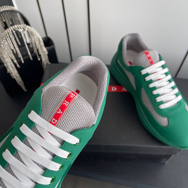 PRADA 26S AMERICA CUP SNEAKERS IN TEAL GREEN SOFT RUBBER AND BIKE FABRIC