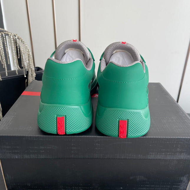 PRADA 26S AMERICA CUP SNEAKERS IN TEAL GREEN SOFT RUBBER AND BIKE FABRIC