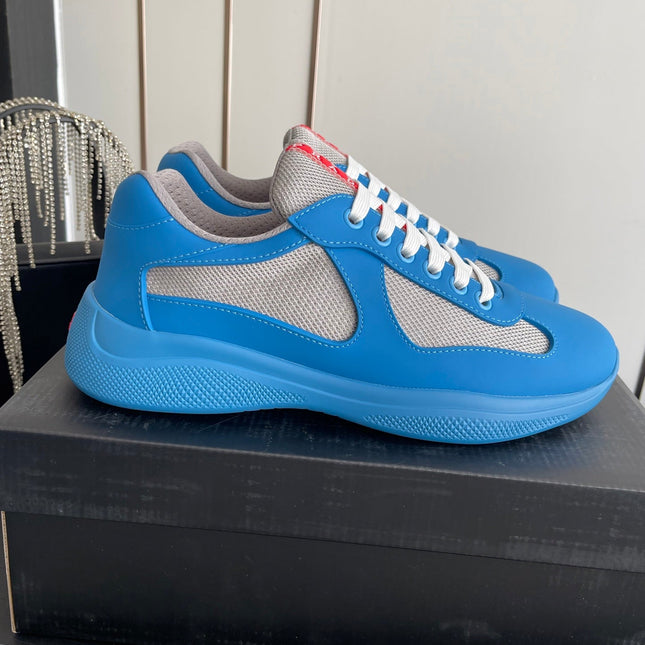 PRADA 26S AMERICA CUP SNEAKERS IN AZURE BLUE SOFT RUBBER AND BIKE FABRIC