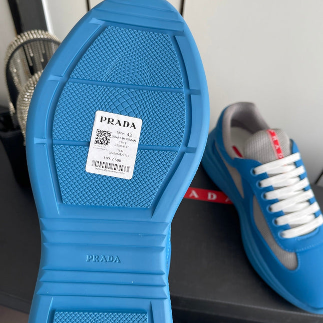 PRADA 26S AMERICA CUP SNEAKERS IN AZURE BLUE SOFT RUBBER AND BIKE FABRIC