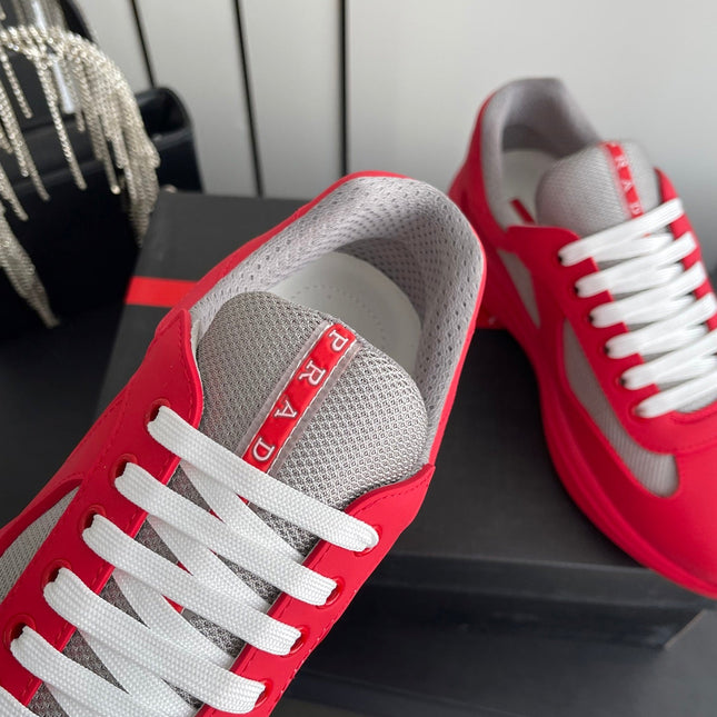 PRADA 26S AMERICA CUP SNEAKERS IN RED SOFT RUBBER AND BIKE FABRIC