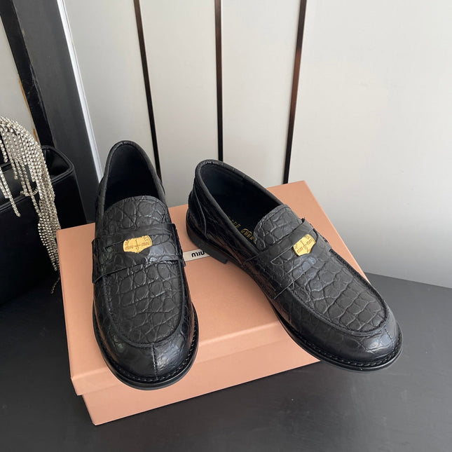 MIUMIU 26S PENNY LOAFERS IN BLACK CALFSKIN CROCODILE EMBOSSING