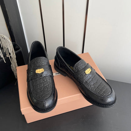 MIUMIU 26S PENNY LOAFERS IN BLACK CALFSKIN CROCODILE EMBOSSING