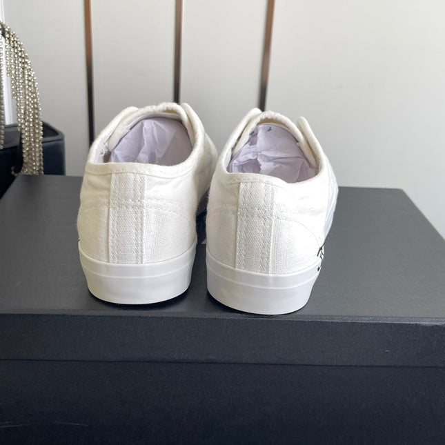 CHANEL 26S LOW TOP SNEAKERS IN WHITE CANVAS