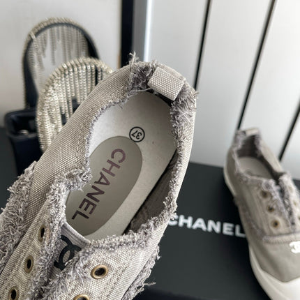 CHANEL 26S LOW TOP SNEAKERS IN GREY FRAYED CANVAS
