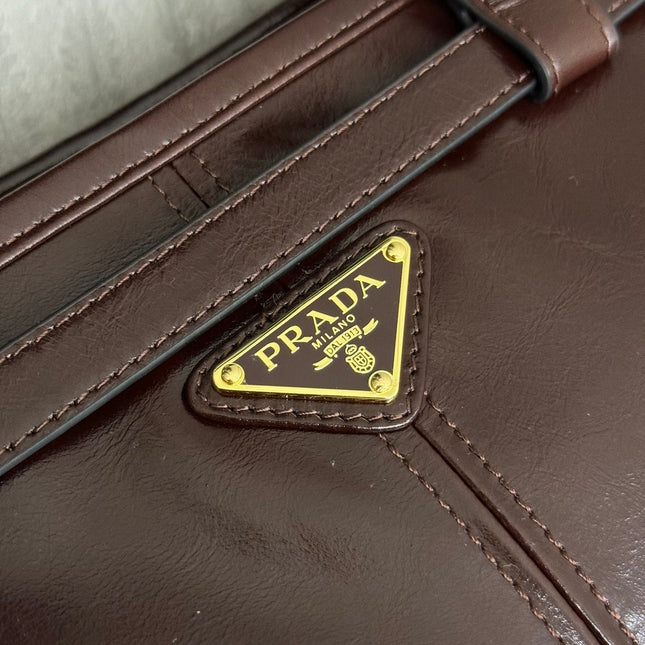 PRADA 25S BONNIE EXTRA-LARGE 42 IN DARK BROWN GLOSSY CALFSKIN GOLD HARDWARE