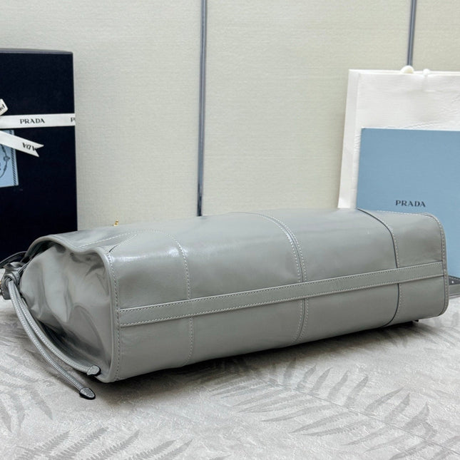 PRADA 25S LUX SOFT BAG 42 IN GRAY GLOSSY CALFSKIN GOLD HARDWARE