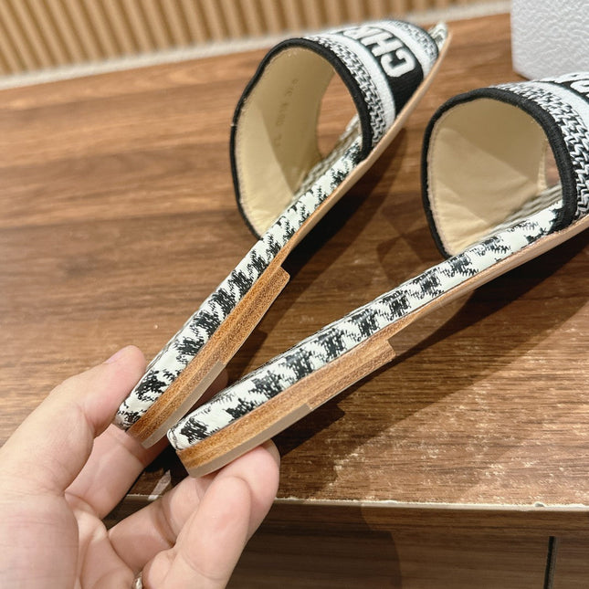 DIOR 26S D-CLUB FLAT SLIDES IN BLACK AND WHITE HOUNDSTOOTH