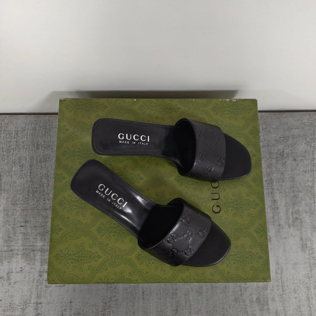GUCCI 26S MULE SANDALS 55MM IN BLACK CALFSKIN GG EMBOSSED