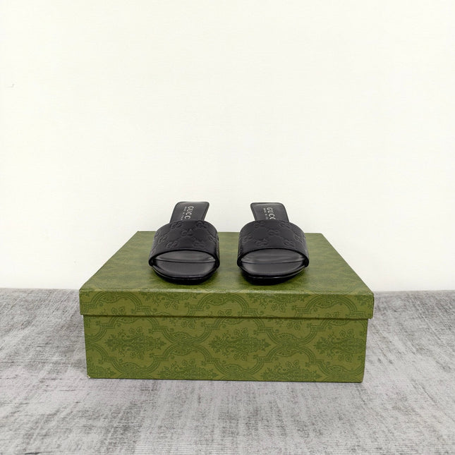 GUCCI 26S MULE SANDALS 55MM IN BLACK CALFSKIN GG EMBOSSED