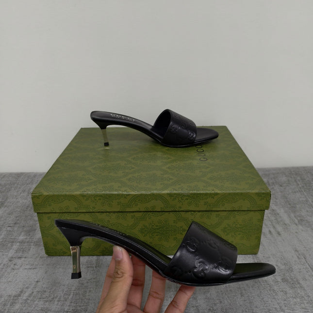 GUCCI 26S MULE SANDALS 55MM IN BLACK CALFSKIN GG EMBOSSED