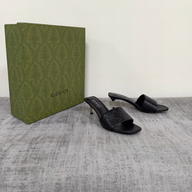GUCCI 26S MULE SANDALS 55MM IN BLACK CALFSKIN GG EMBOSSED