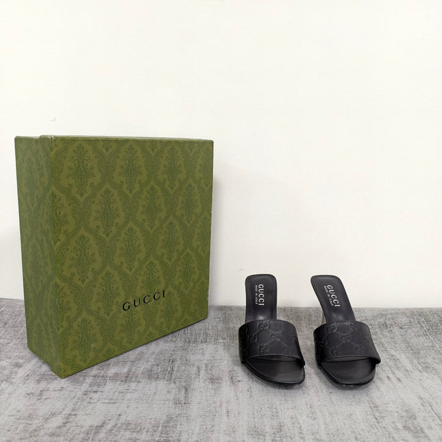 GUCCI 26S MULE SANDALS 85MM IN BLACK CALFSKIN GG EMBOSSED