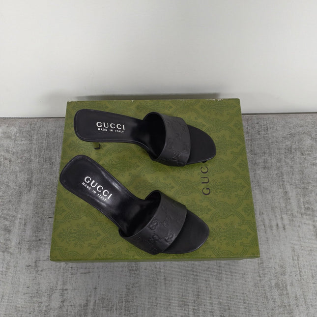 GUCCI 26S MULE SANDALS 85MM IN BLACK CALFSKIN GG EMBOSSED