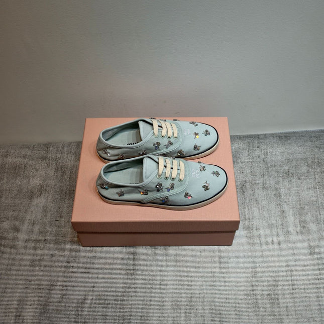 MIUMIU 26S LOW TOP SNEAKERS IN LIGHT BLUE CANVAS CRYSTAL-EMBELLISHED