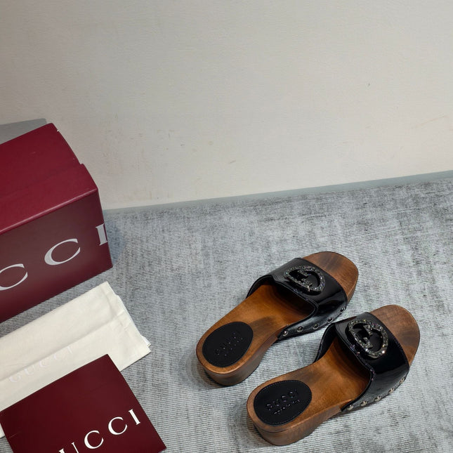 GUCCI 26S PLATFORM MULES IN BLACK PATENT CALFSKIN