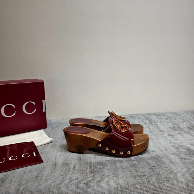 GUCCI 26S PLATFORM MULES IN BURGUNDY RED PATENT CALFSKIN GOLD HARDWARE
