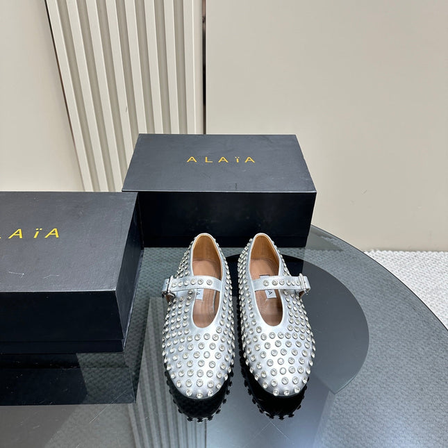 ALAIA CRYSTAL EMBELLISHED BALLET FLATS IN SILVER CALFSKIN