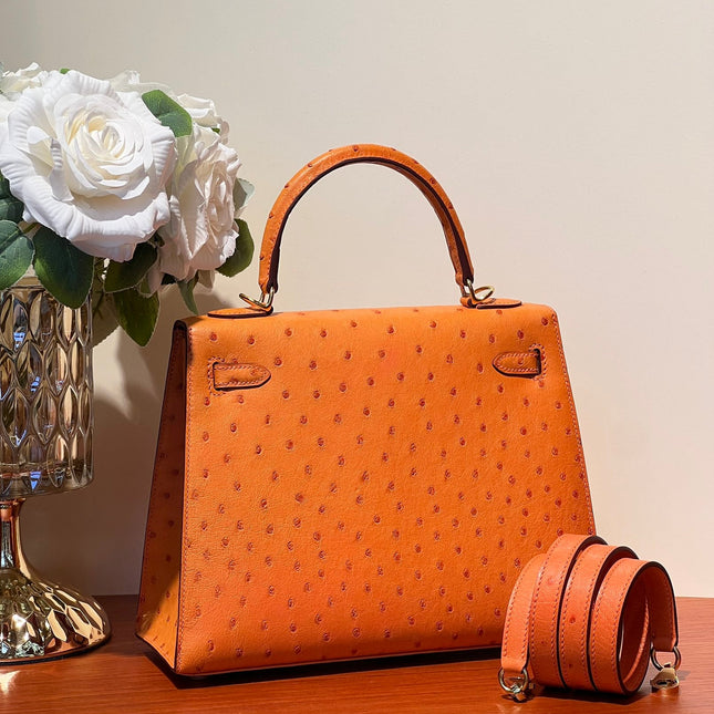 KELLY SELLIER 25 BAG IN FIRE ORANGE OSTRICH LEATHER WITH GOLD HARDWARE