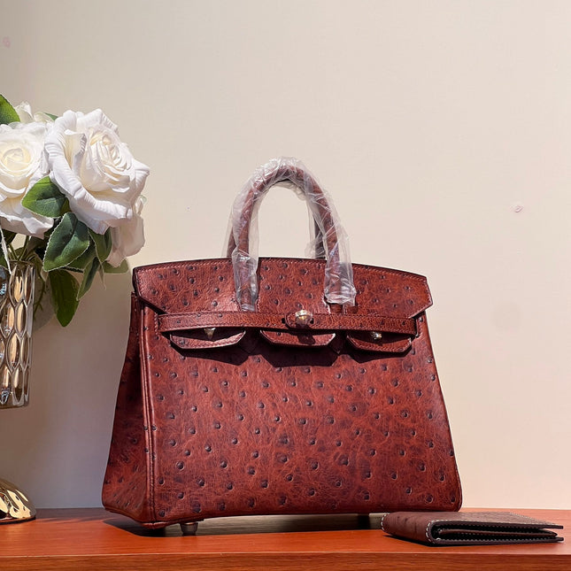 KELLY SELLIER 25 BAG IN BERRY RED OSTRICH LEATHER WITH GOLD HARDWARE