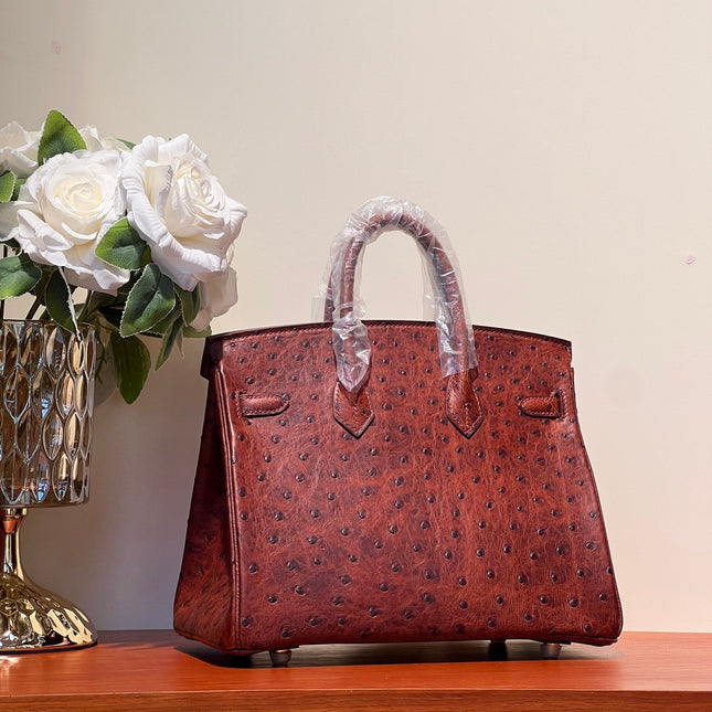KELLY SELLIER 25 BAG IN BERRY RED OSTRICH LEATHER WITH GOLD HARDWARE