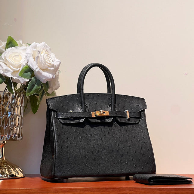 KELLY SELLIER 25 BAG IN BLACK OSTRICH LEATHER WITH GOLD HARDWARE