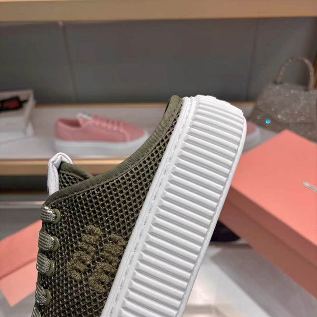 MIUMIU 26S SNEAKER MULES 45MM IN DARK OLIVE GREEN MESH