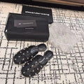 RHODES STUDDED FLAT MULE IN BLACK CALFSKIN