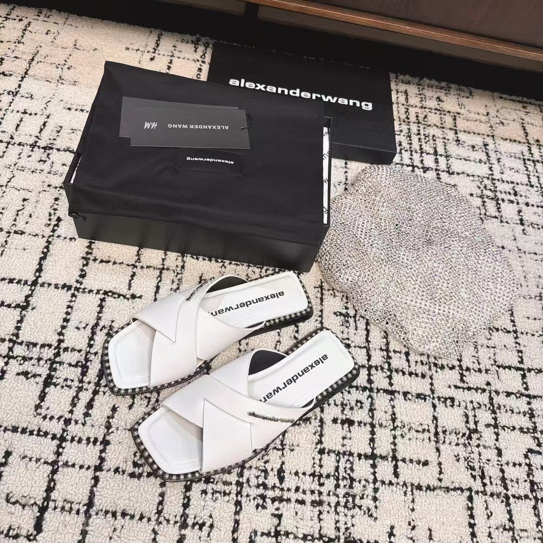 RHODES STUDDED SLIDE SANDAL IN WHITE CALFSKIN