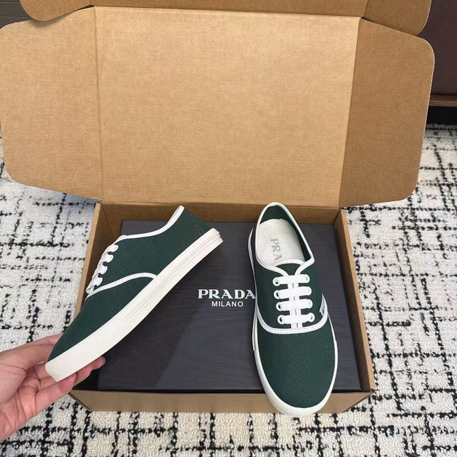 PRADA 26S LACE UP SNEAKERS IN DARK TEAL CANVAS