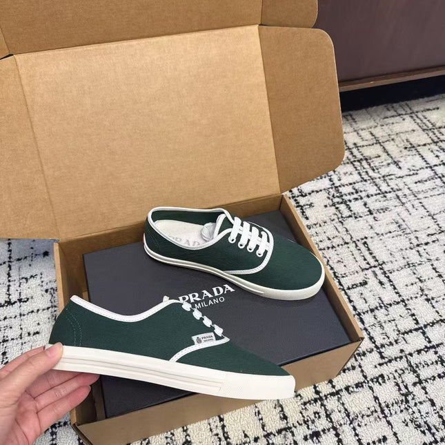 PRADA 26S LACE UP SNEAKERS IN DARK TEAL CANVAS
