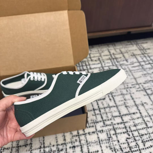 PRADA 26S LACE UP SNEAKERS IN DARK TEAL CANVAS