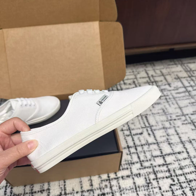 PRADA 26S LACE UP SNEAKERS IN WHITE CANVAS