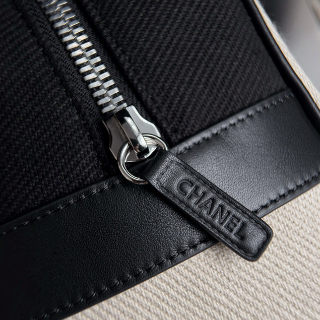 CHANEL 26S LARGE ZIP POUCH BAG 29 IN BEIGE CANVAS AND CALFSKIN SILVER HARDWARE