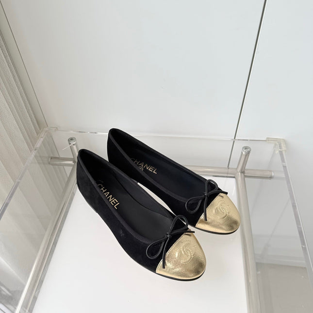 CHANEL 26S BALLET FLATS IN BLACK SUEDE WITH GOLD TOE CAP AND BOW