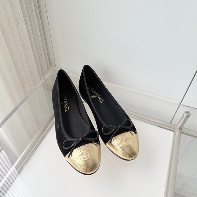 CHANEL 26S BALLET FLATS IN BLACK SUEDE WITH GOLD TOE CAP AND BOW