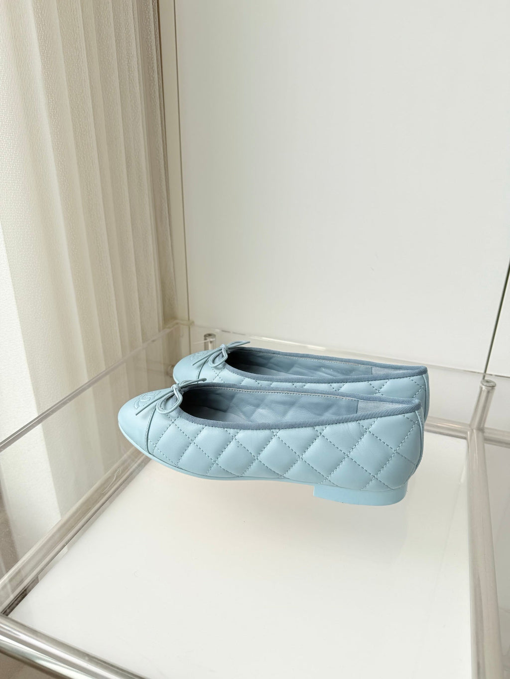 CHANEL 26S BALLET FLATS IN LIGHT BLUE QUILTED CALFSKIN WITH BOW