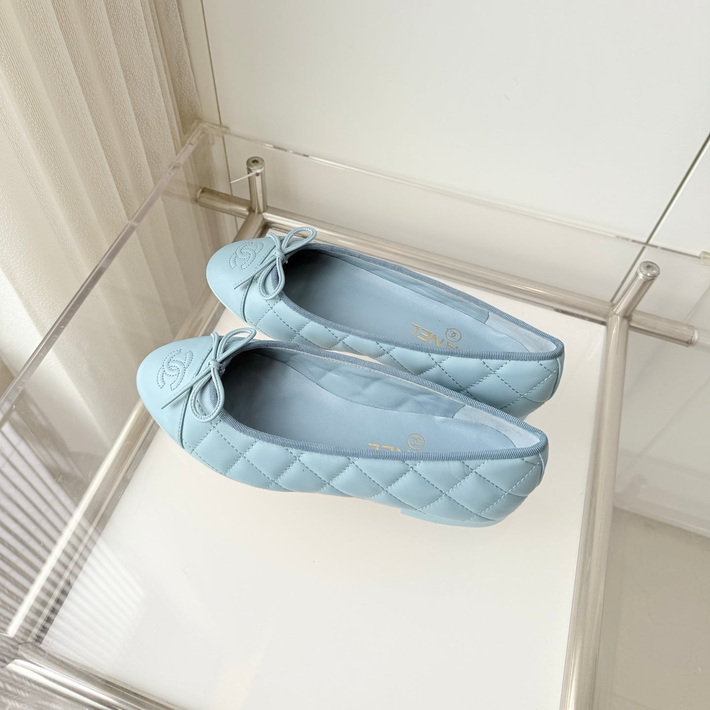 CHANEL 26S BALLET FLATS IN LIGHT BLUE QUILTED CALFSKIN WITH BOW