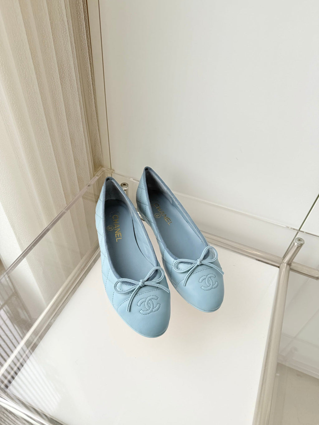 CHANEL 26S BALLET FLATS IN LIGHT BLUE QUILTED CALFSKIN WITH BOW
