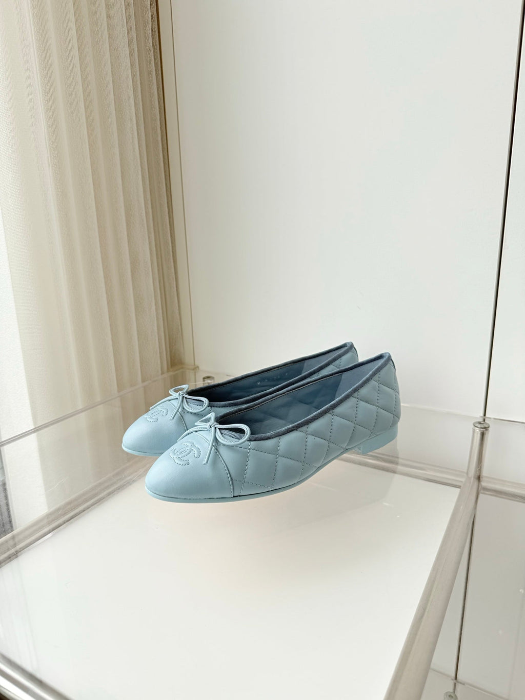 CHANEL 26S BALLET FLATS IN LIGHT BLUE QUILTED CALFSKIN WITH BOW