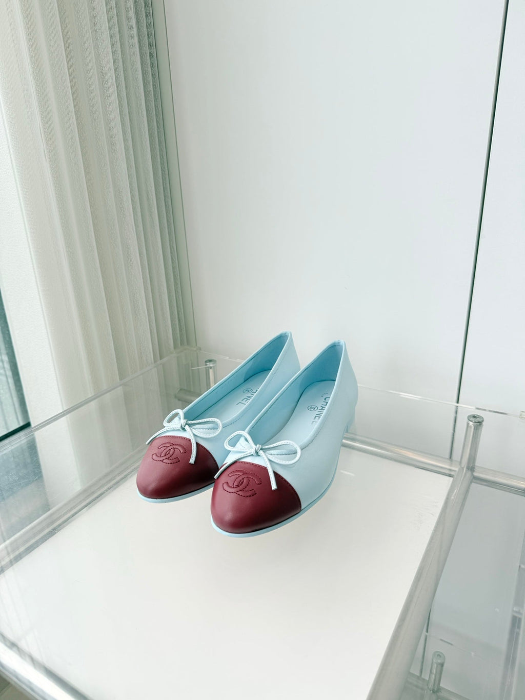 CHANEL 26S BALLET FLATS IN LIGHT BLUE CALFSKIN WITH BURGUNDY RED PATENT TOE CAP & BOW