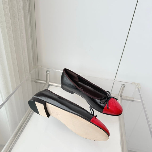 CHANEL 26S BALLET FLATS IN DARK BROWN CALFSKIN WITH RED PATENT TOE CAP & BOW
