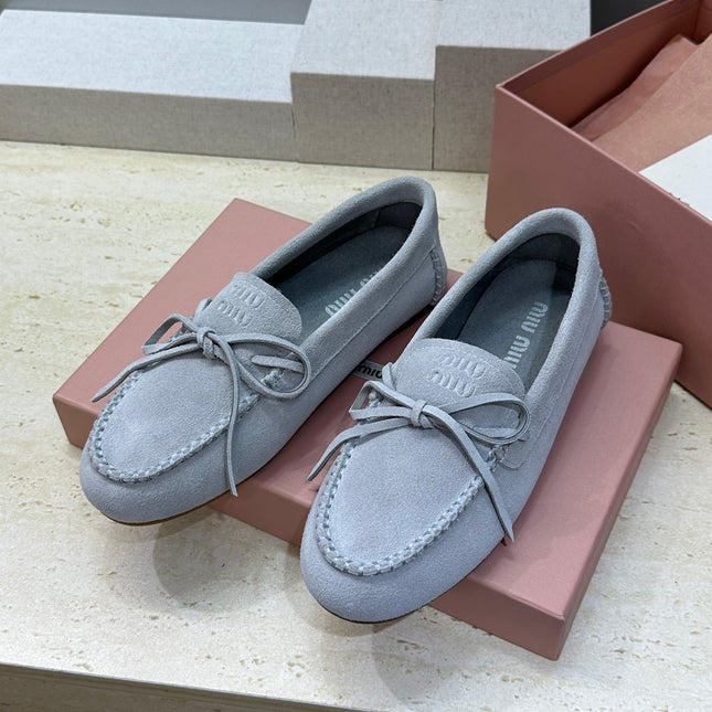 MIUMIU 26S LOAFERS IN LIGHT BLUE SUEDE WITH BOW