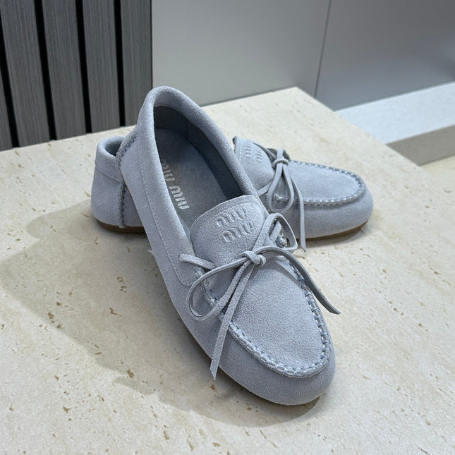 MIUMIU 26S LOAFERS IN LIGHT BLUE SUEDE WITH BOW