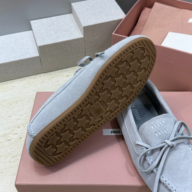 MIUMIU 26S LOAFERS IN LIGHT BLUE SUEDE WITH BOW