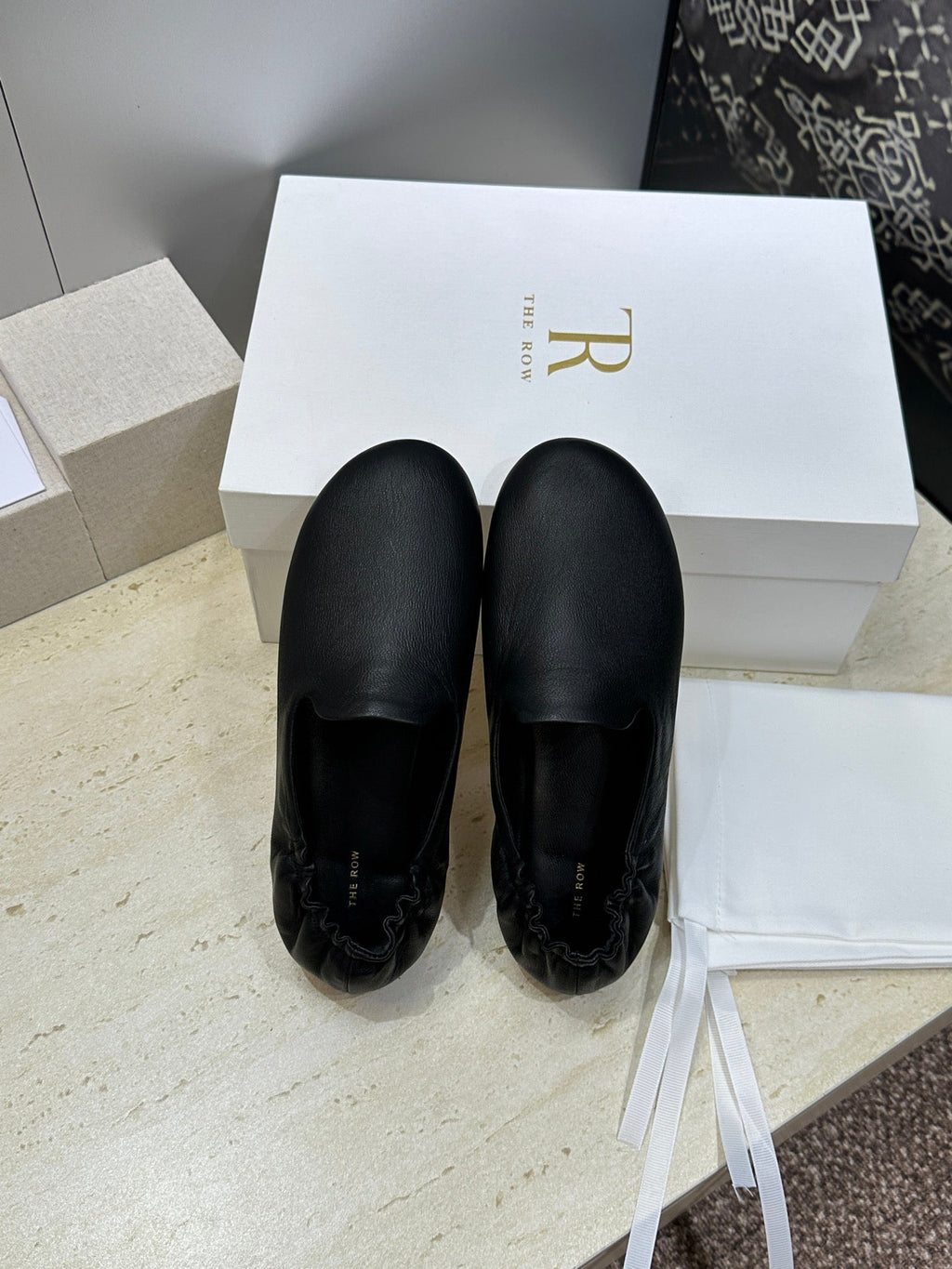 THE ROW 26S BALLET FLATS IN BLACK CALFSKIN