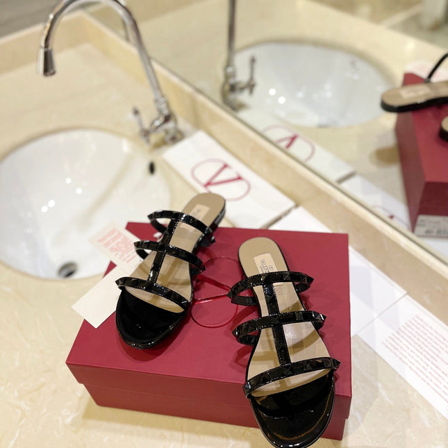 VALENTINO 26S ROCKSTUD CAGED SANDALS IN BLACK PATENT CALFSKIN
