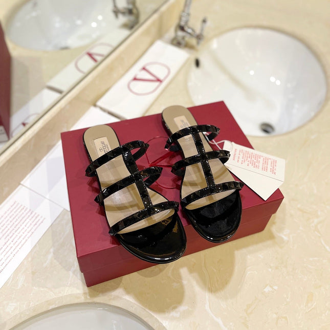 VALENTINO 26S ROCKSTUD CAGED SANDALS IN BLACK PATENT CALFSKIN