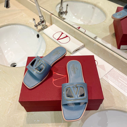 VALENTINO 26S SLIDES IN PASTEL BLUE CALFSKIN WITH LOGO